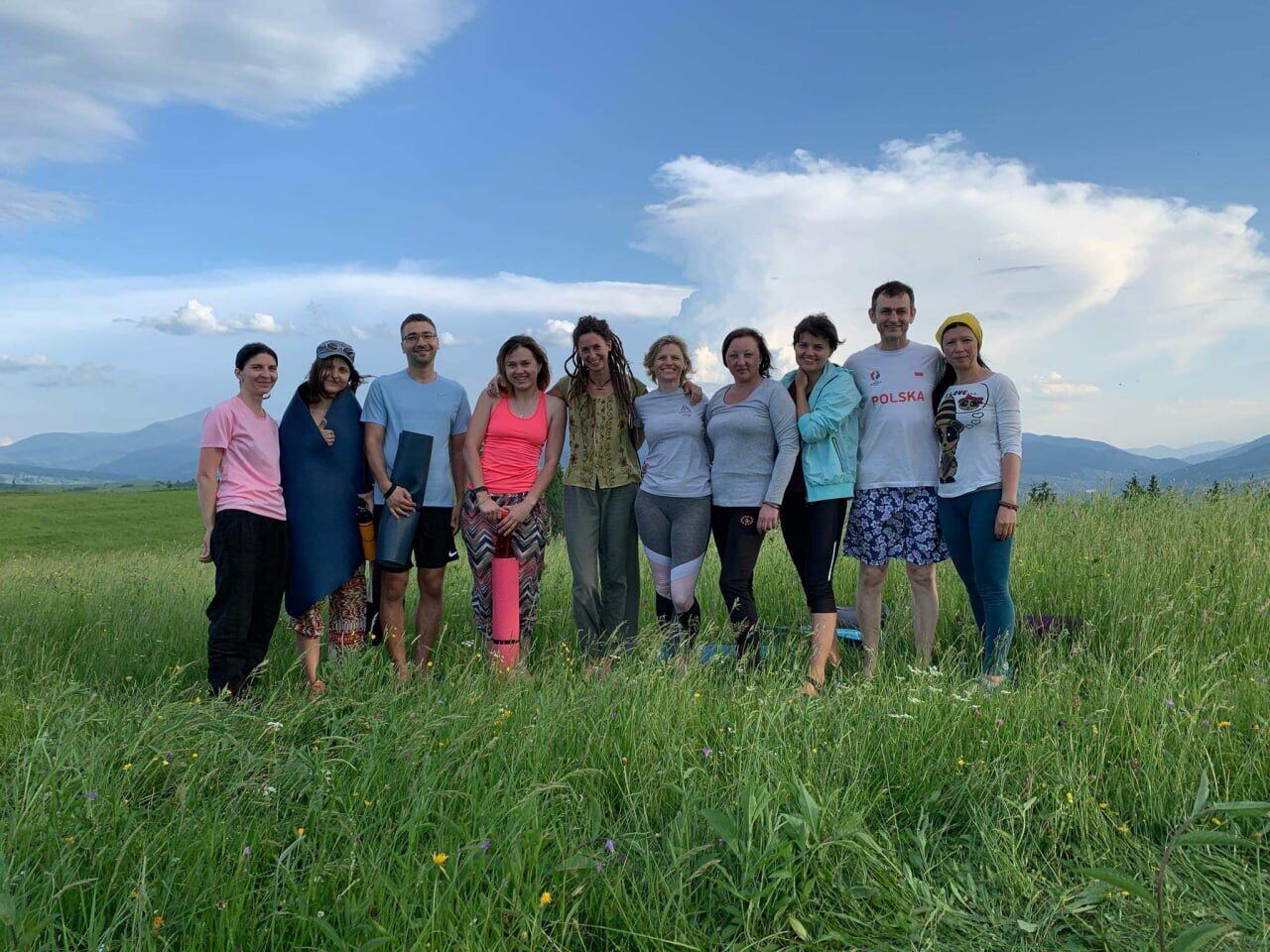 Gruppenbild auf einer Bergwiese